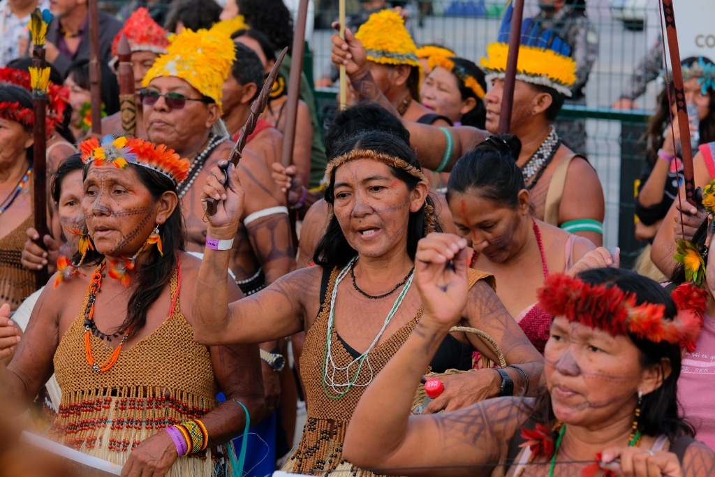 Munduruku indigenous people hold a demonstration at COP30.